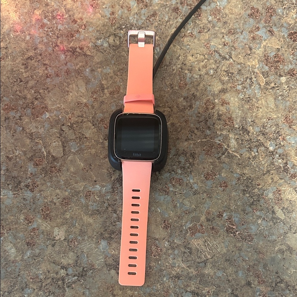 Fitbit Smartwatch with Coral Band
